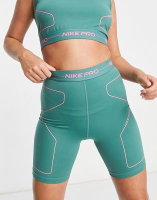 Nike Pro Training Dri-FIT Combat Gear high-waisted legging shorts in green and pink