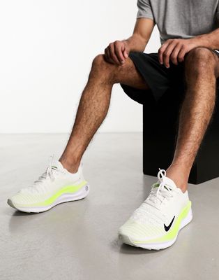Nike Running React Infinity Flyknit 4 sneakers in white and yellow