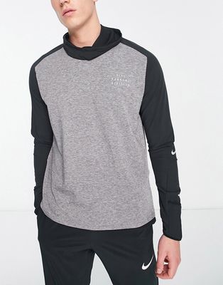 Nike Running Run Division Statement Sphere element long sleeve top in gray-Black