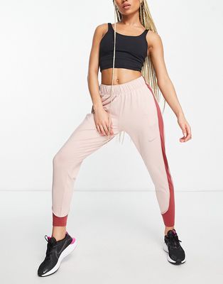 Nike Running Therma-FIT Essential leggings in pale pink