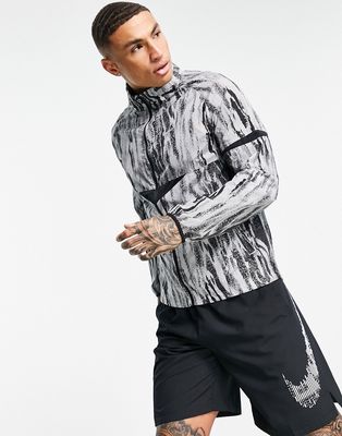 Nike Running Wild Run printed windrunner jacket in gray