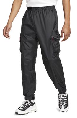 Nike Sportswear Repel Tech Woven Cargo Pants in Black/Black/Pink Glow/Black