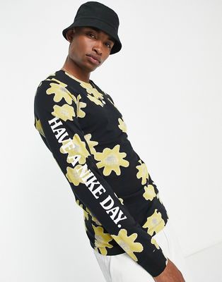 Nike Statement floral print long sleeve t-shirt in black