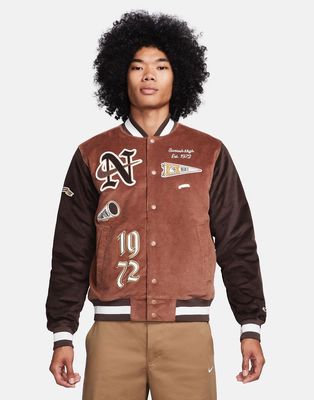 Nike Swoosh corduroy bomber jacket in brown