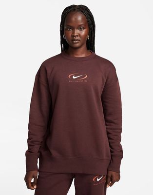 Nike Swoosh oversized fleece sweatshirt in earth brown