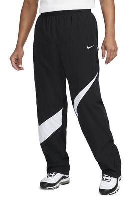 Nike Swoosh Water Repellent Nylon Pants in Black/White/White