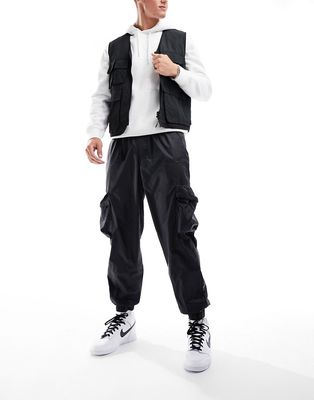 Nike Tech Essentials wind sweatpants in black