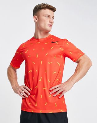 Nike Training Dri-FIT all over swoosh print T-shirt in red