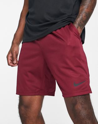 Nike Training Dri-FIT knit 8inch shorts in burgundy-Purple