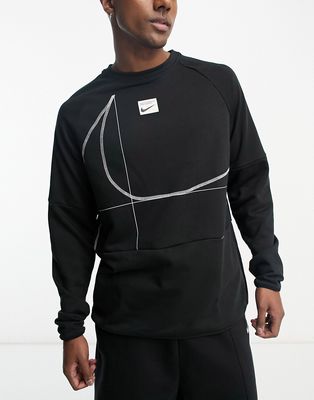 Nike Training Dri-FIT Swoosh Logo long sleeve t-shirt in black