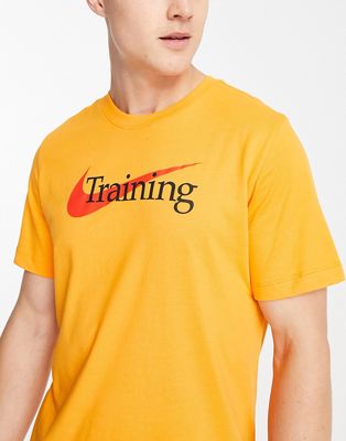 Nike Training Dri-FIT Swoosh logo t-shirt in mustard-Yellow