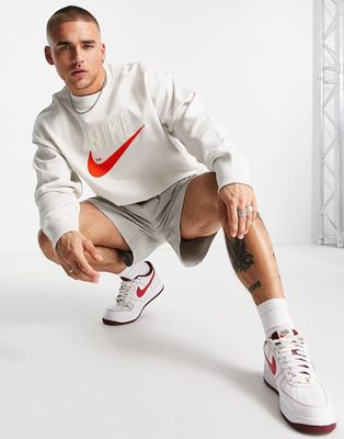 Nike Trend Fleece retro logo crew neck sweatshirt in stone-Neutral