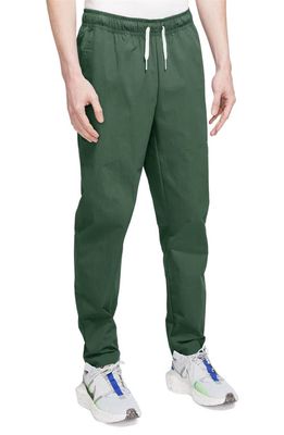 Nike Woven Tapered Leg Pants in Fir/White