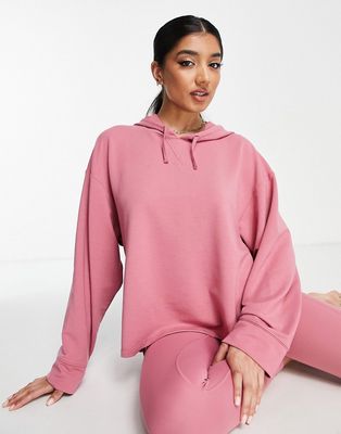 Nike Yoga Dri-FIT fleece hoodie in pink