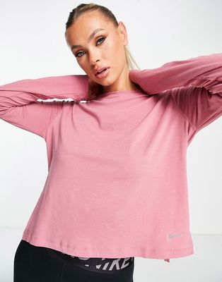 Nike Yoga Dri-FIT long sleeve t-shirt in pink