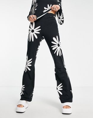 Noisy May exclusive flared pants in black daisy print - part of a set