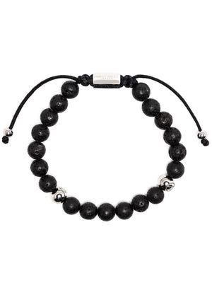 Northskull asymmetric bead-embellished bracelet - Black
