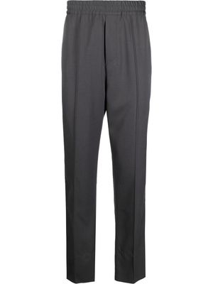 OAMC elasticated tailored-cut trousers - Grey