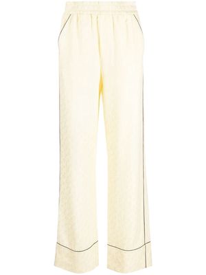 Off-White logo-jacquard elasticated trousers - Yellow