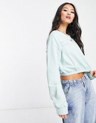 Only cropped elasticated sweatshirt in light blue