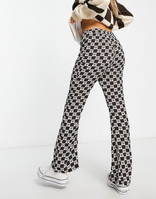 Only flared pants in brown heart print