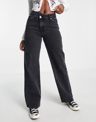 Only high waisted wide leg jeans with uneven closure in black