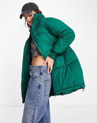 Only padded coat with packable hood in green