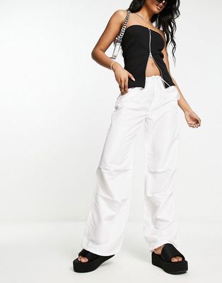 Only parachute pants in white