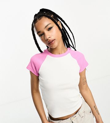 Only Petite exclusive contrast raglan t-shirt in white and pink