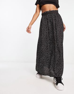 Only pleated midi skirt in black spot print