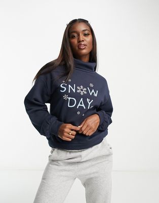 Only turtle neck snow day Christmas sweater in navy