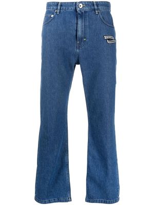 Opening Ceremony embroidered logo-patch tapered jeans - Blue