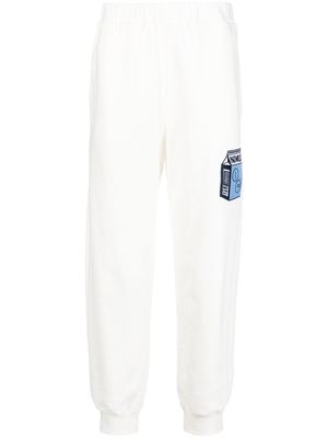 Opening Ceremony Milk patch track pants - White