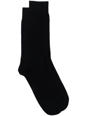 Organic Basics logo-print knitted socks - Black