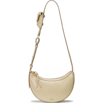 Oryany Rookie Crescent Crackled Leather Crossbody Bag in Butter Cream 