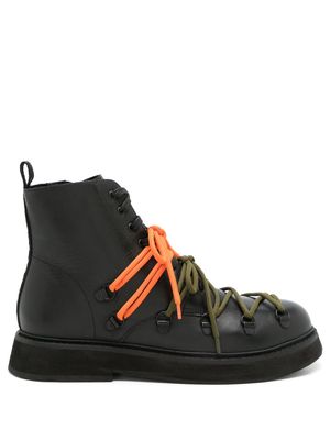 Osklen logo-debossed leather ankle boots - Black