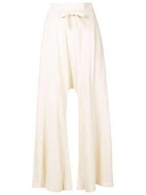 Osklen tied-waist flared trousers - White