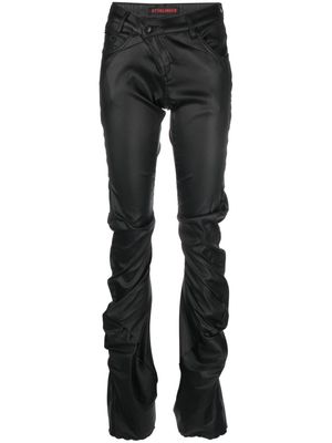 Ottolinger asymmetric ruched slim-cut trousers - Black