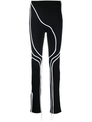 Ottolinger contrast-trim flared trousers - Black