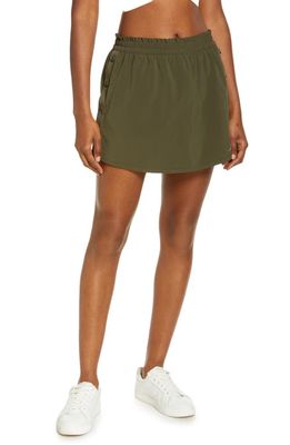 Outdoor Voices Snap Detail Stretch Recycled Polyester Blend Skort in Forest