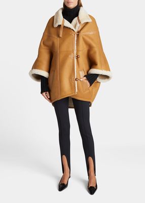 Oversized Leather Cape with Shearling Lining
