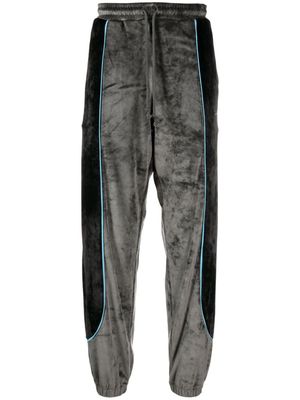 PACCBET logo-embroidered velour track pants - Black