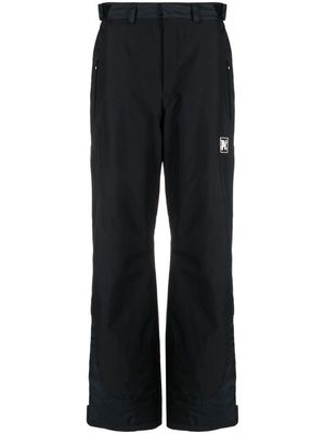 Palm Angels logo-patch padded ski trousers - Black