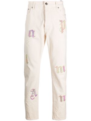 Palm Angels logo-patch straight-leg trousers - Neutrals