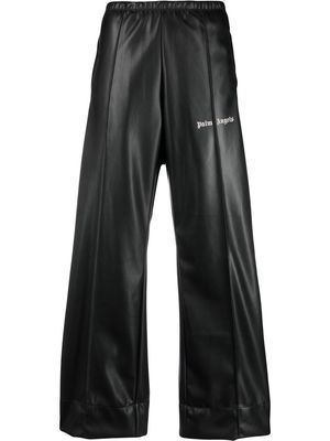 Palm Angels logo-print faux-leather track pants - Black