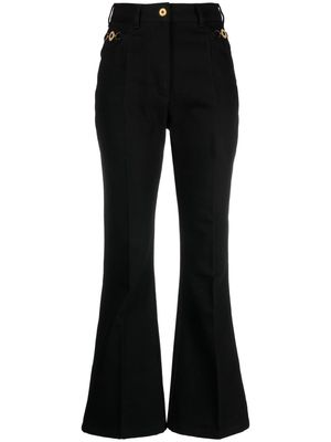 Patou logo-embroidered flared jeans - Black