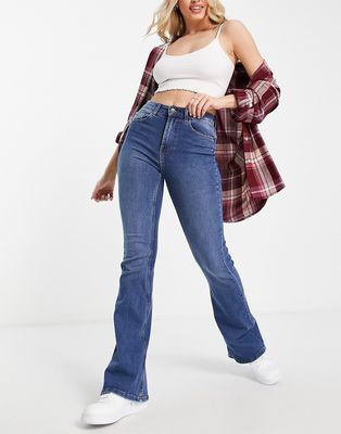 Pieces Peggy high waist flared jeans in mid blue denim