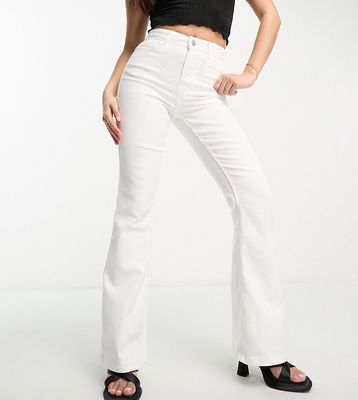 Pieces Petite Peggy flared jeans in white