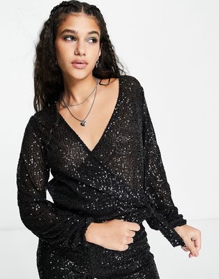 Pieces sequin balloon sleeve wrap top in black - part of a set