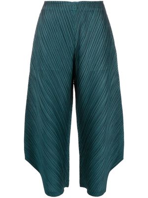 Pleats Please Issey Miyake fully-pleated plissé cropped palazzo trousers - Green